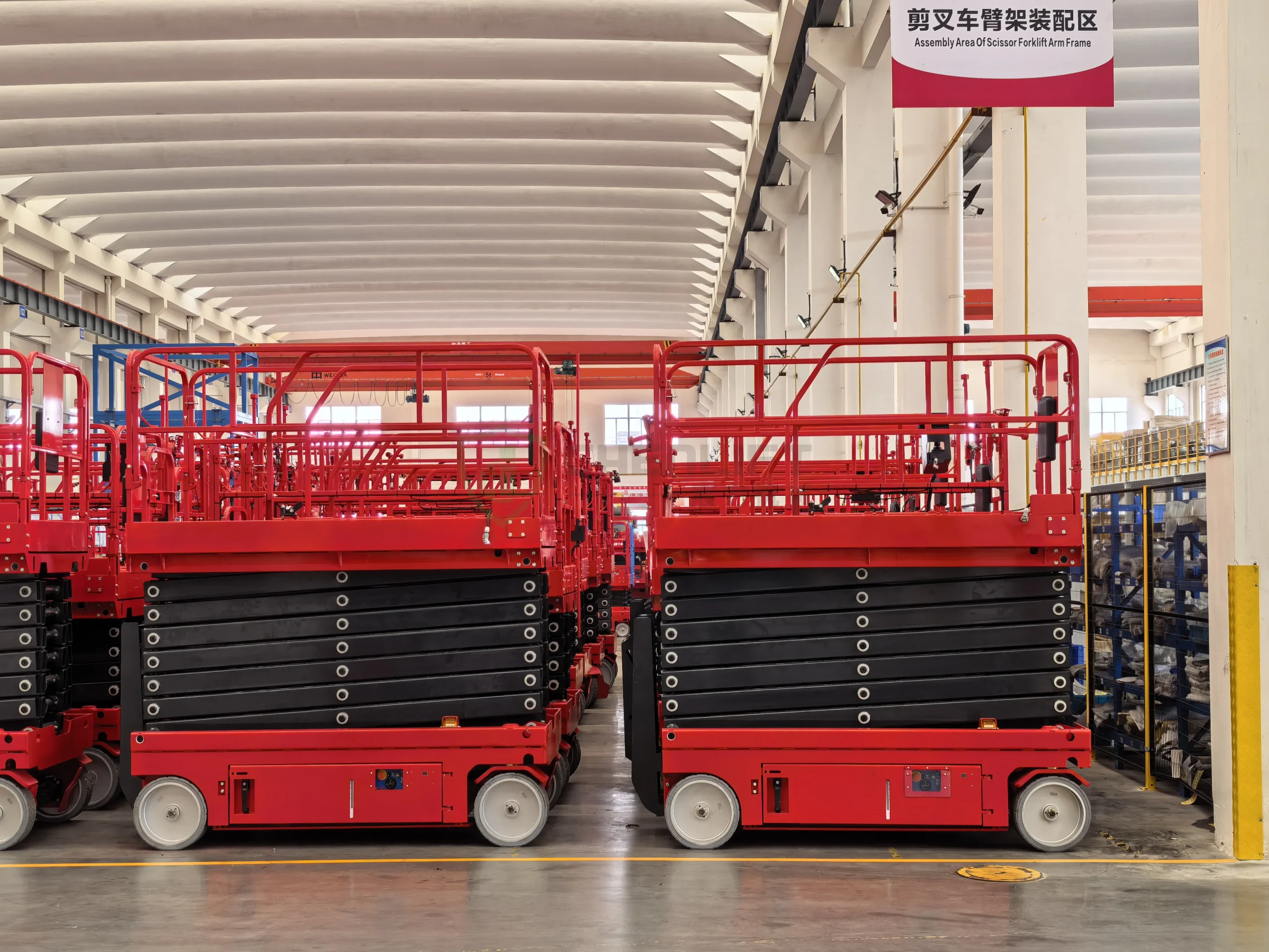 Chenlift scissor lift arm assembly area